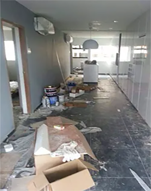 House Cleaning. Image of corporate office hall way under construction before cleaning.